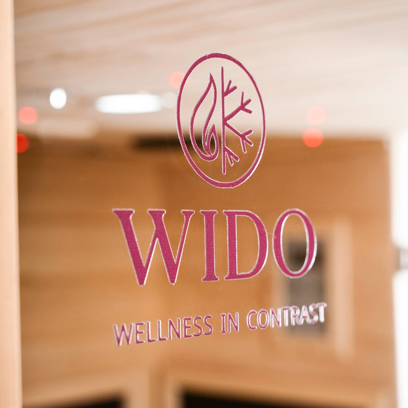 Smooth Canadian hemlock panels and glass door of WIDO infrared sauna